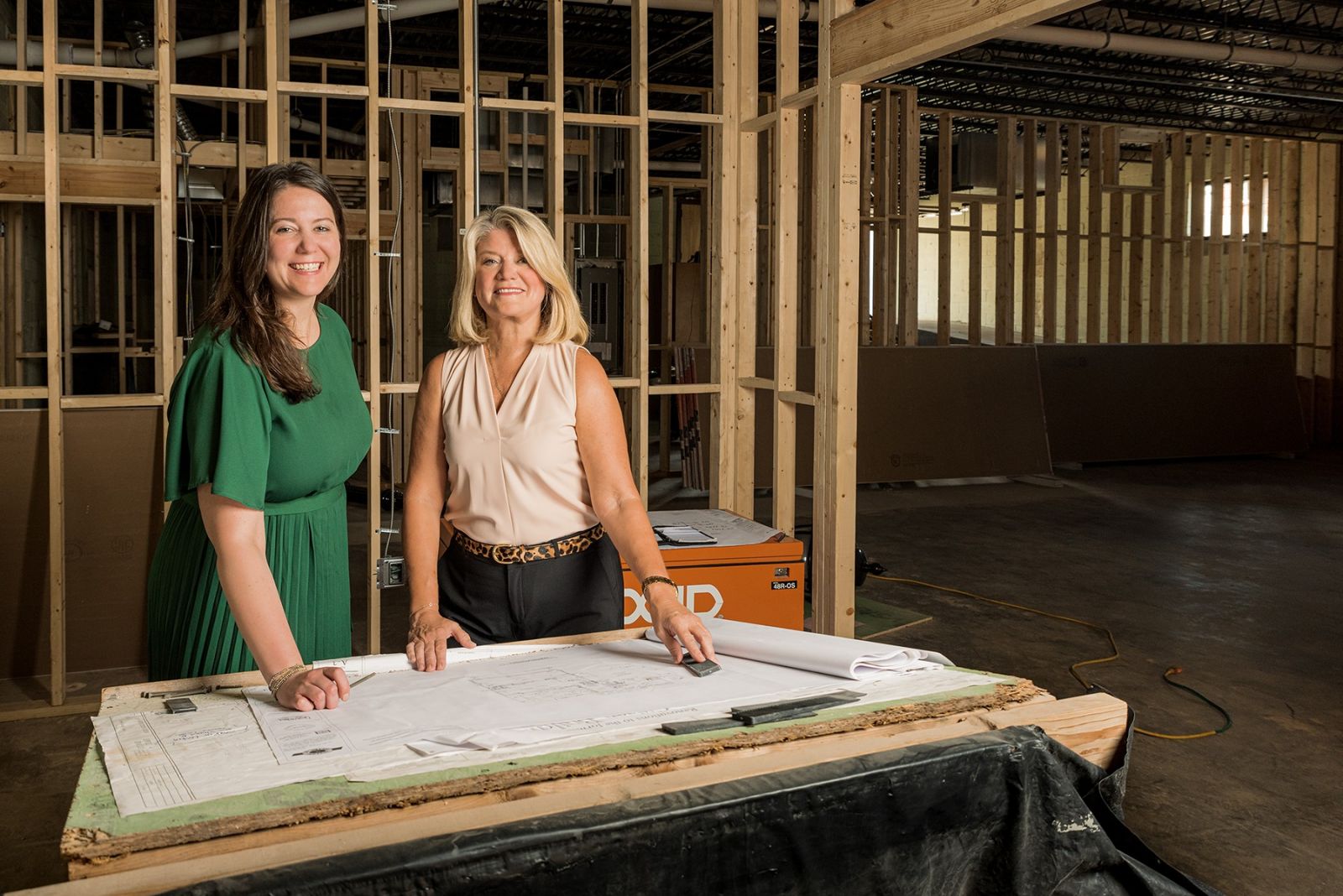 Stouffer and Mastny examine renovation blueprints. (Photo/Provided)