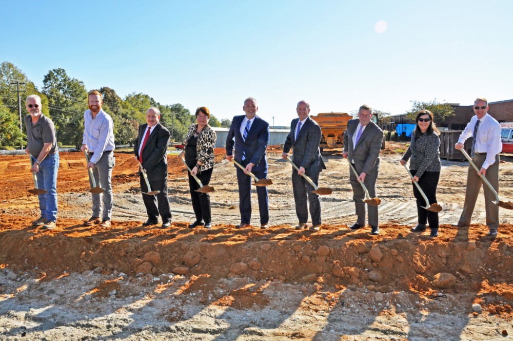 Officials and staff from The Carolina Center for Behavioral Health break ground to expand the Greer facilities.