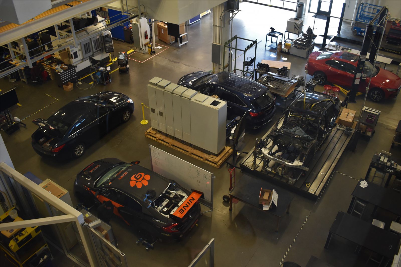 This view of CU-ICAR's student garage features the work of the Deep Orange 9 team, a hybrid rallycross Honda racer that can also bring spectators into the driver's seat using virtual reality. (Photo/Molly Hulsey)
