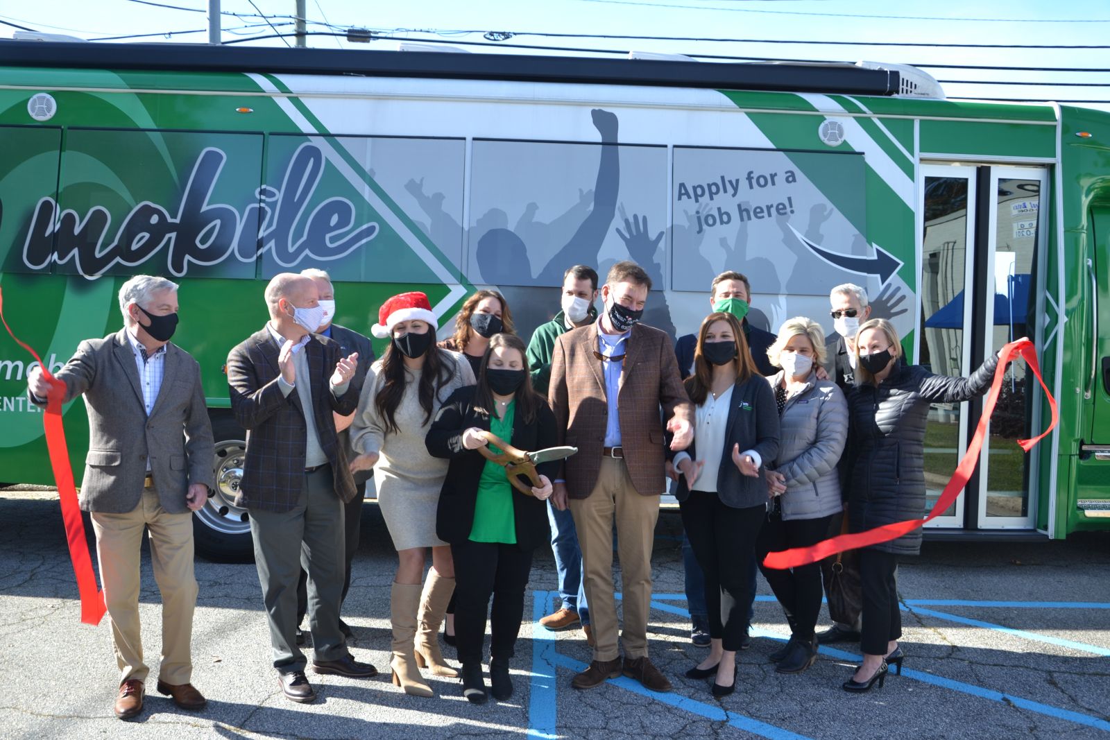 HTI executives cut the ribbon on their new Greenwood location at 500 Montague Ave. Wednesday. (Photo/Ross Norton)