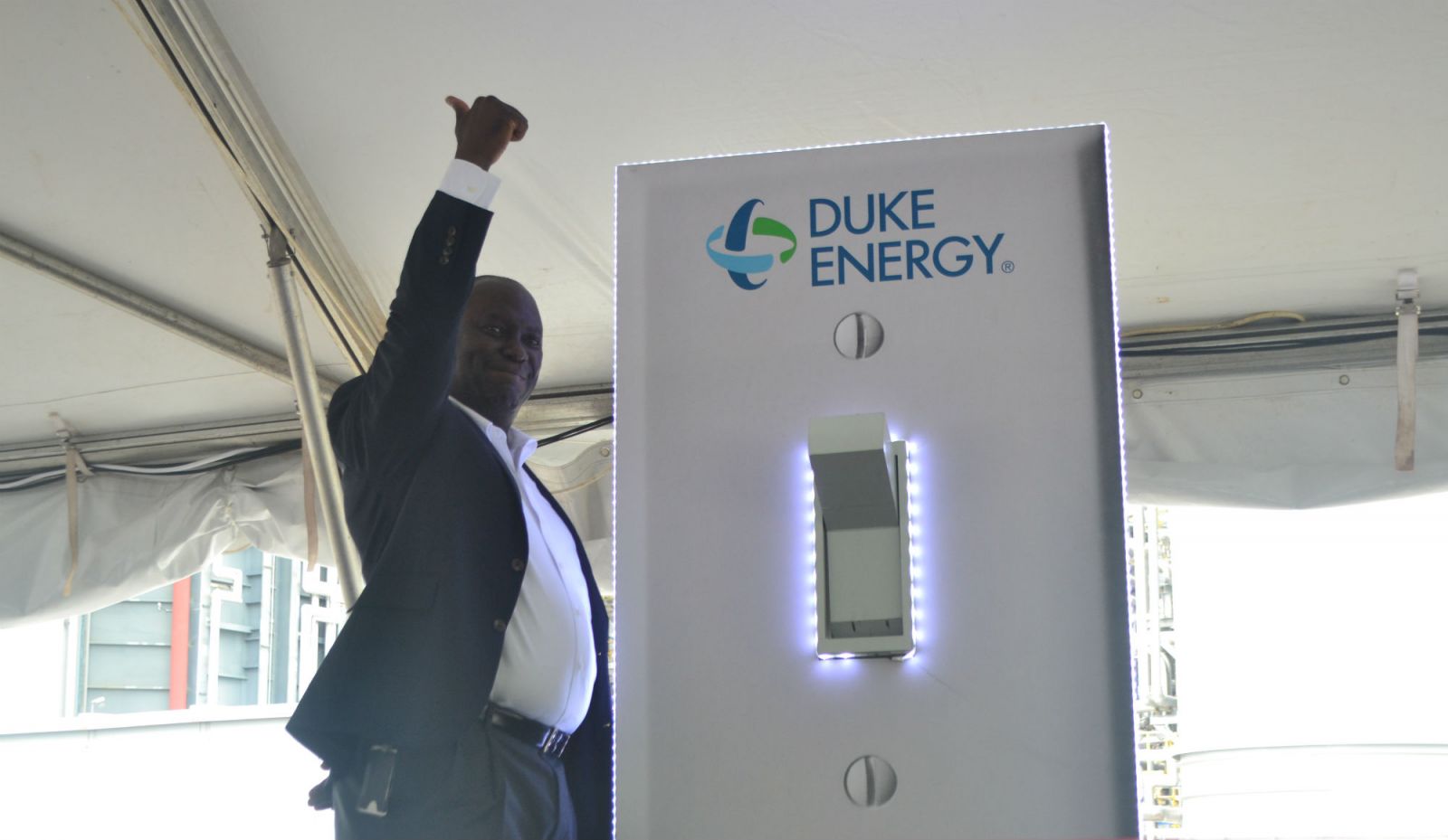 Kodwo Ghartey-Tagoe, president of Duke Energy South Carolina, flips the switch at W.S. Lee Station. (Photo/Teresa Cutlip)