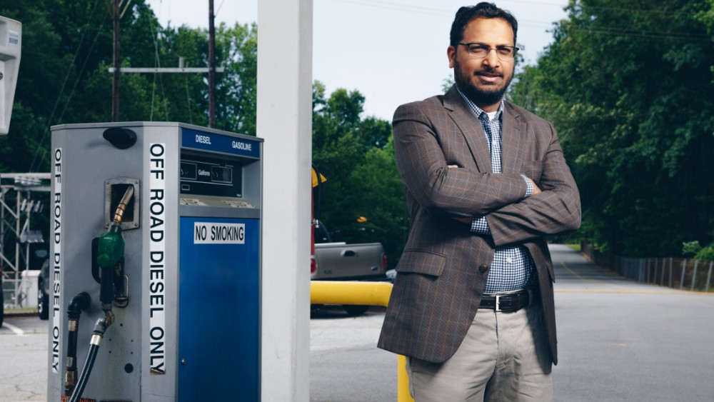 Furman University economist Taha Kasim is researching ways consumers are encouraged to adjust their driving habits for the betterment of the environment. (Photo/Furman University)