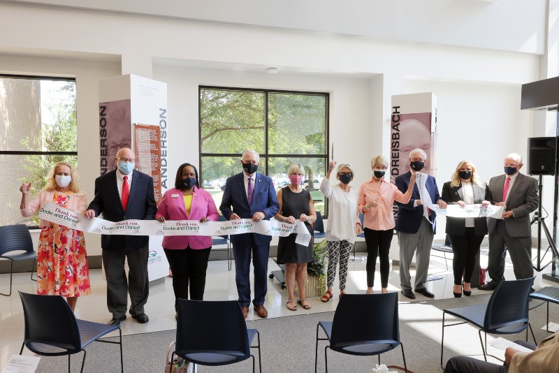 Greenville Tech staff membeers and officials cut the ribbon on the new student center. (Photo/Provided)