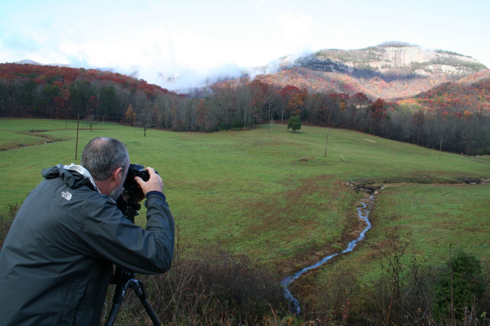 A photographer takes a photo of Table Rock at Grant Meadow, a protected site near S.C. Highway 11 in Pickens County. (Photo/Provided)
