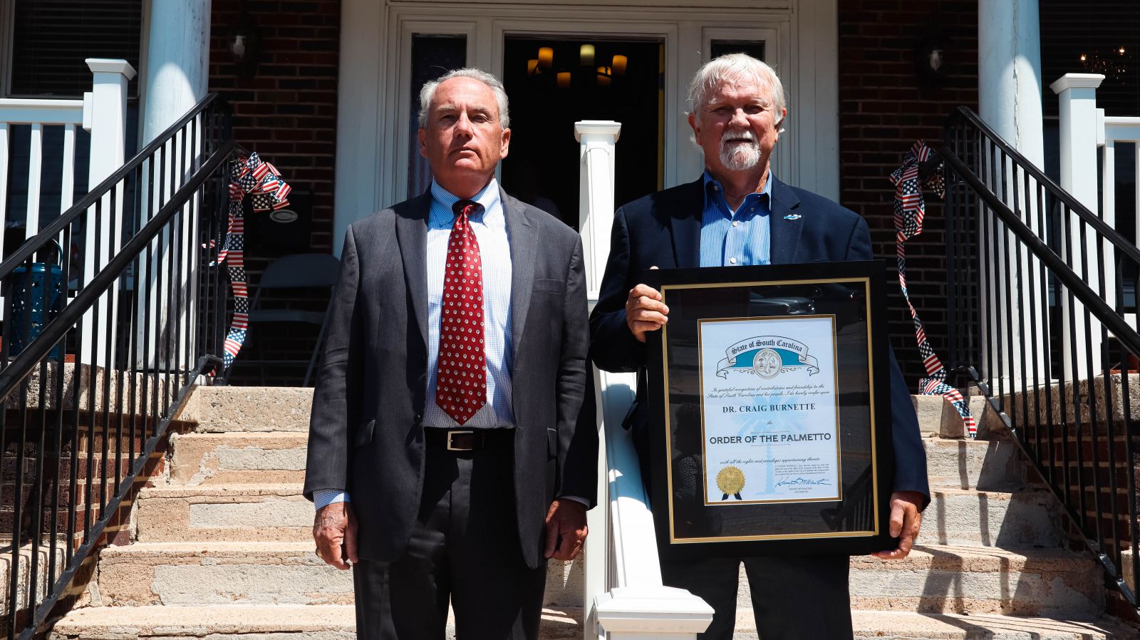  S.C. Department of Veterans Affairs Secretary William Grimsley presented Burnette the award during the opening of the Warriors Once More residence. (Photo/Provided)