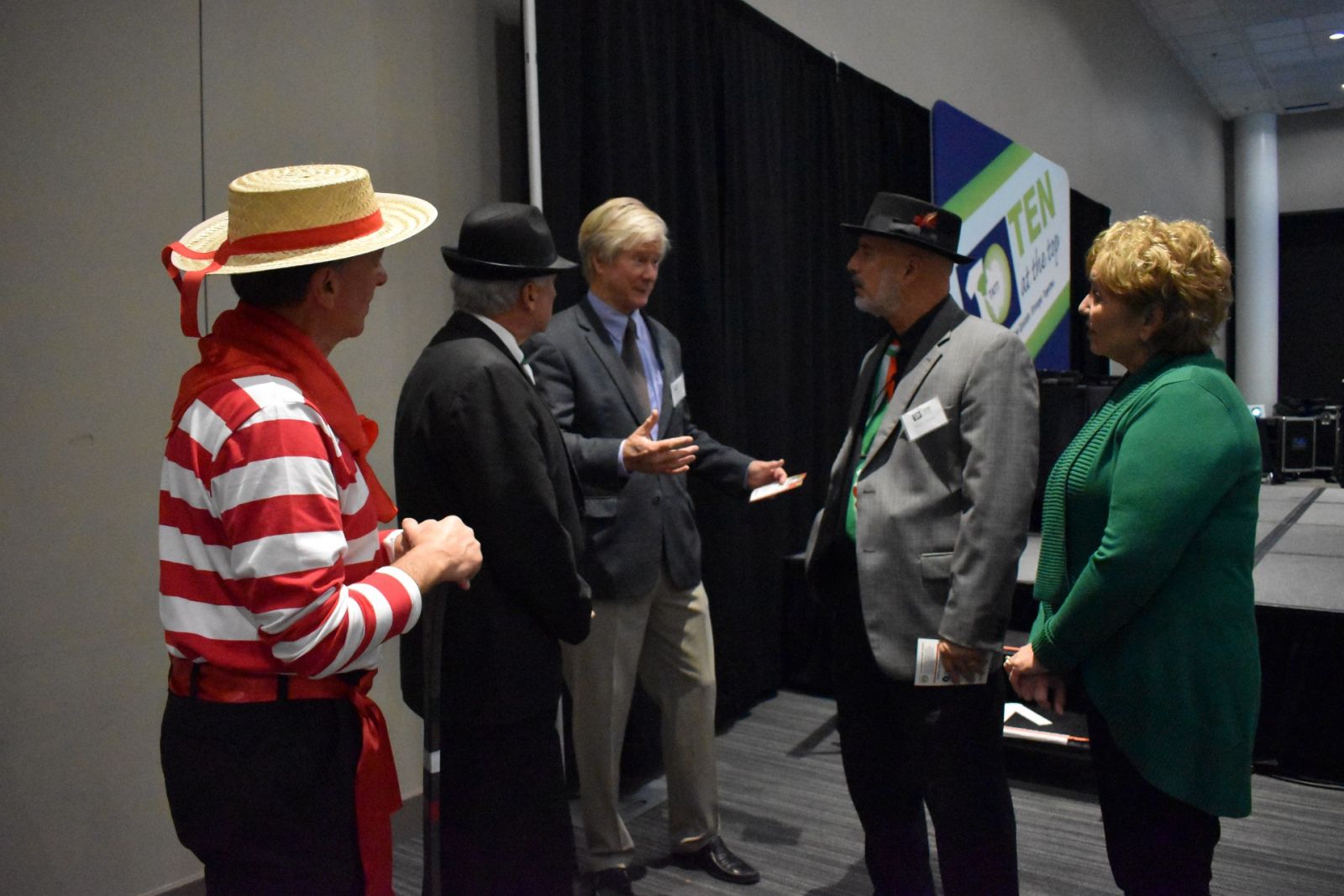 Members of the Italian American Club of Greater Greenville speak with Hughes Investments' Phil Hughes. (Photo/Molly Hulsey)
