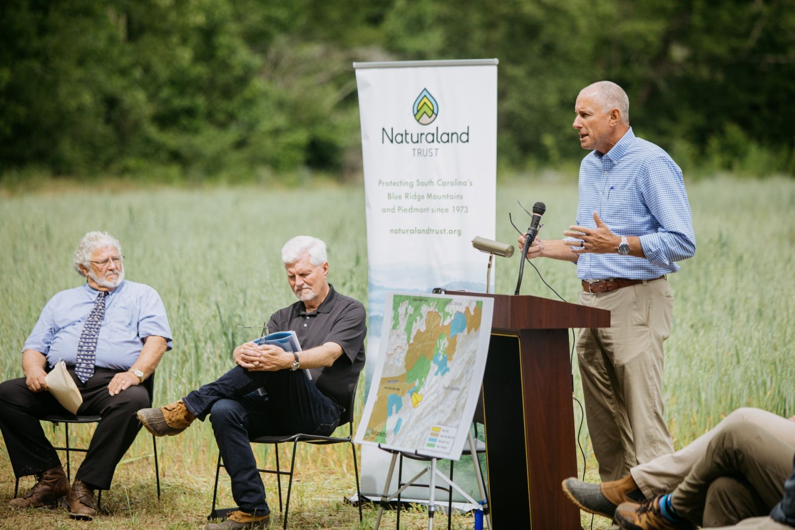 Ledbetter address the crowd, including Greenville County Councilmember Joe Dill and Carlton Owens of the Greenville County Historic and Natural Resources Trust, at a May 24 press conference celebrating the conservation of the property. (Photo/Mac Stone)