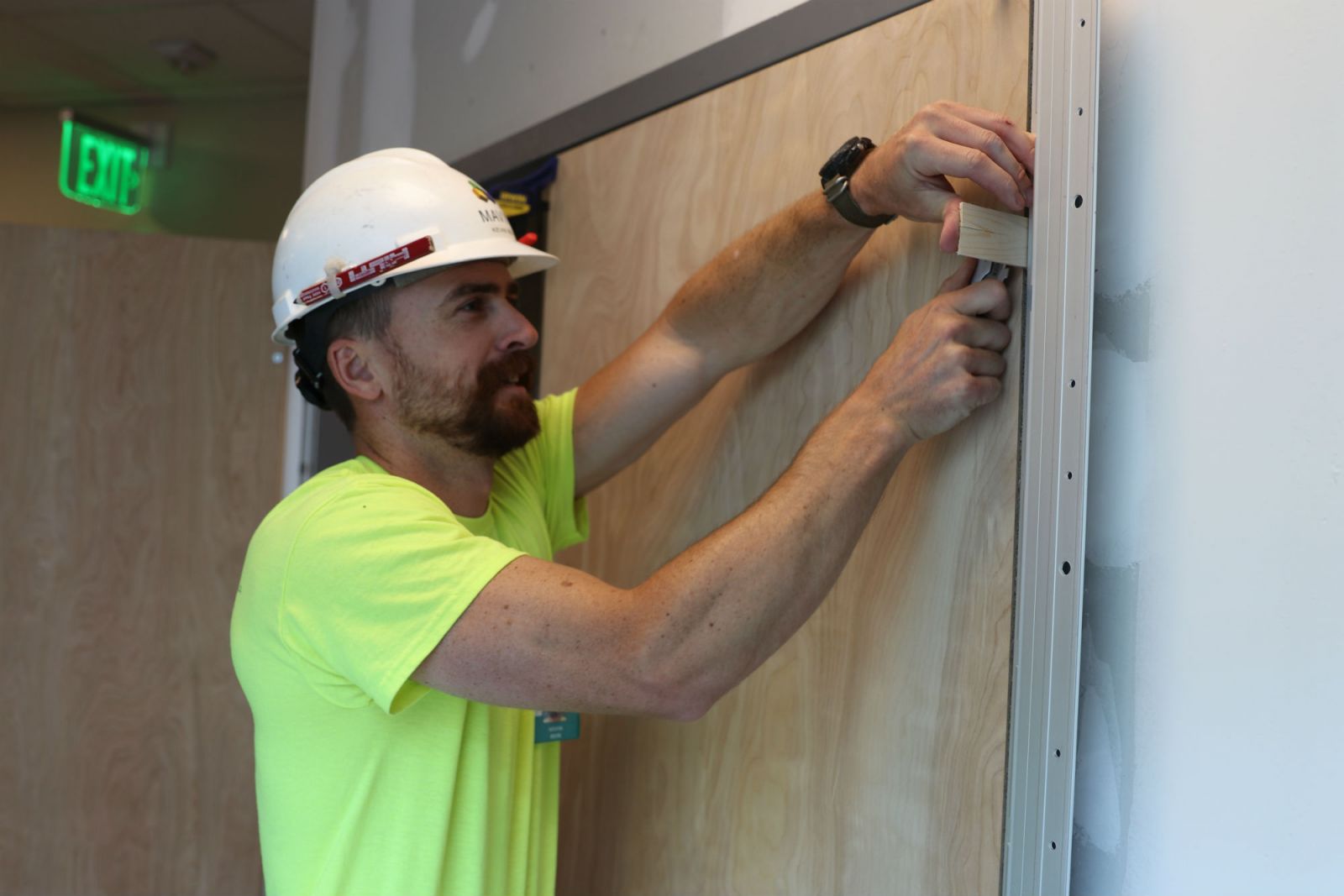 Kevin Bein, with Mavin Construction, works on the Escape Lounge at GSP. (Photo/Provided)