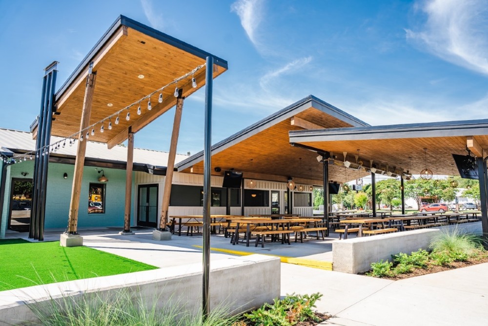 Lewis Barbecue Greenville's outdoor dining space was created to extend the sense of community that existed with the site's longtime occupant, Tommy's Ham House. (Photo/Savannah Bockus) 