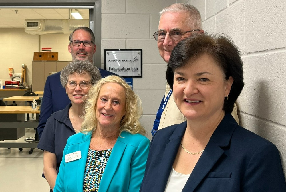 Larry Miller, Stacy Brandon, Ann Wright and Carl Washburn (left to right) of Greenville Technical College with Kim Howard of Lockheed Martin at the Lockheed Martin Fabrication Lab, part of Greenville Technical College's Aircraft Maintenance Technology training facility. (Photo/Provided) 