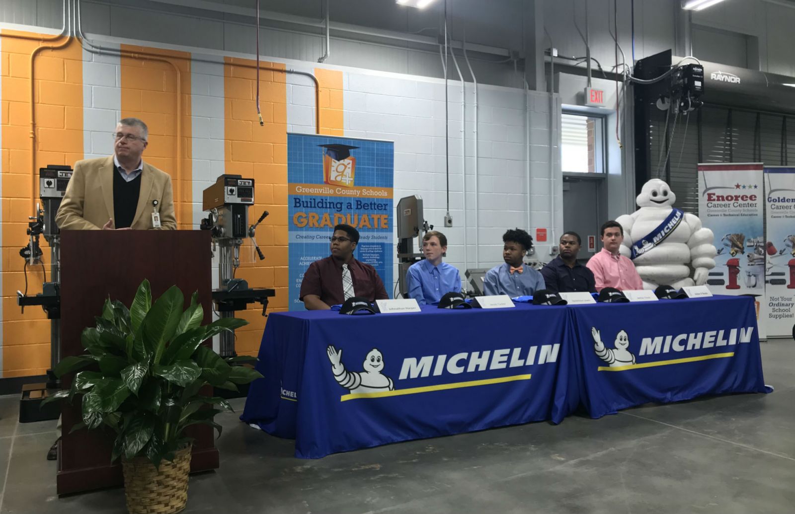 Michelin North America and Greenville County schools partnered for the Michelin Youth Apprenticeship program and held a signing day for the first five apprentices. From left, Burke Royster, superintendent of Greenville County schools, and apprentices Johnathan Harper, Jacob Tucker, Iquavious Lewis, Janias Tinch and Aidan O'Boyle. (Photo/Teresa Cutlip)
