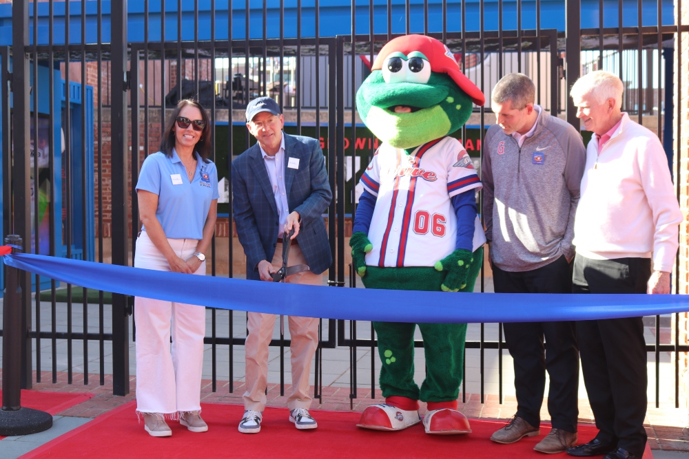 Milliken Chief Marketing Officer Danna Vetter, CEO Halsey Cook, mascot Reedy Rip'It, Greenville Drive Team President Jeff Brown and team owner Craig Brown officially dedicate Milliken Plaza at the opening game on Tuesday evening. (Photo/Provided)