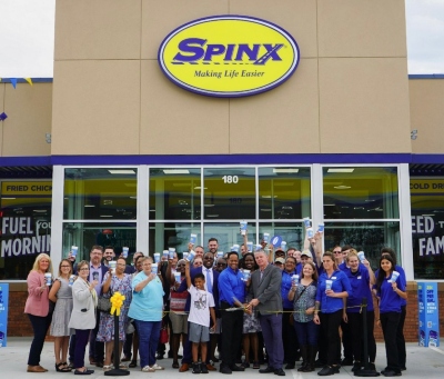 Employees and supporters dedicate the latest Spinx store, this one located in Oconee County's West Union. (Photo/Provided)