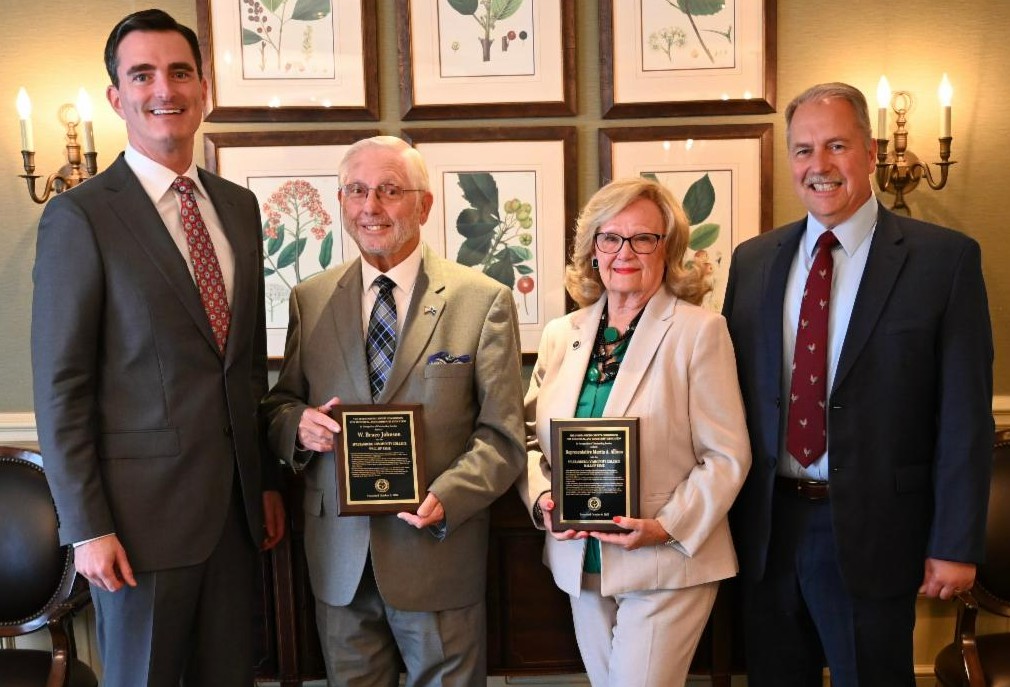 SCC President Michael Mikota and Spartanburg County Commission on Technical and Community Education Chairman Sonny Anderson present Representative Rita Allison & Mr. Bruce Johnson with plaques commemorating their induction into SCC's Wall of Fame.  (Photo/Provided)